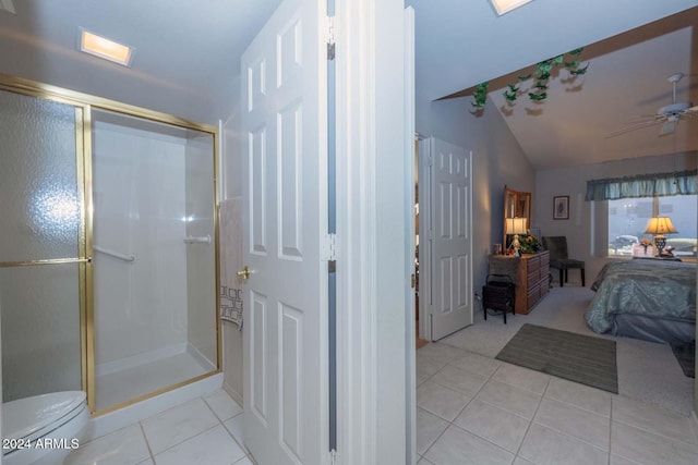 bathroom featuring tile patterned flooring, ceiling fan, an enclosed shower, and lofted ceiling