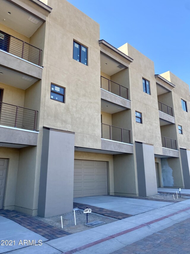 view of property featuring a garage