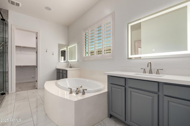 26860 N 102nd Ln, Peoria, AZ 85383 - full bath with visible vents, a sink, marble finish floor, and a shower stall