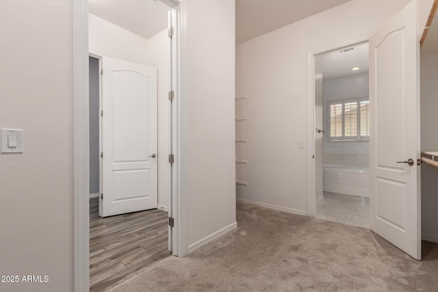 26860 N 102nd Ln, Peoria, AZ 85383 - hall with baseboards, visible vents, and light carpet