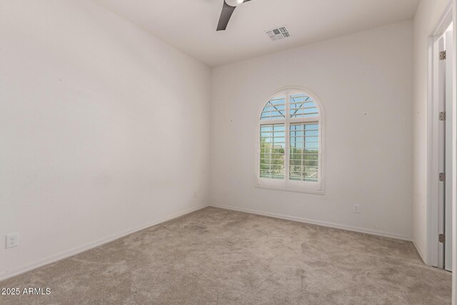 26860 N 102nd Ln, Peoria, AZ 85383 - spare room featuring baseboards, ceiling fan, carpet, and visible vents