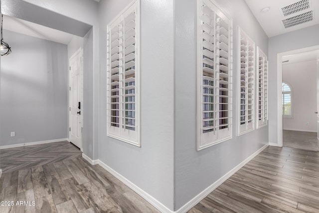 26860 N 102nd Ln, Peoria, AZ 85383 - hallway featuring baseboards, wood finished floors, and visible vents