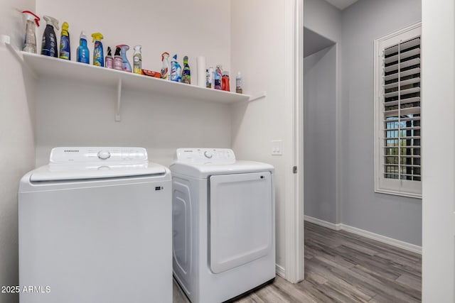 26860 N 102nd Ln, Peoria, AZ 85383 - washroom featuring laundry area, light wood-style floors, baseboards, and washer and dryer