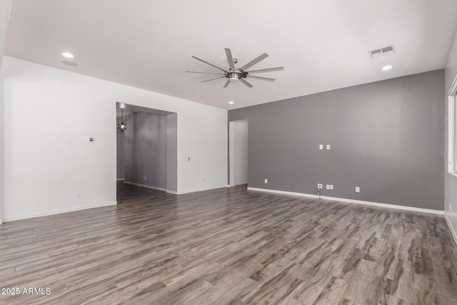 26860 N 102nd Ln, Peoria, AZ 85383 - empty room featuring a ceiling fan, baseboards, recessed lighting, wood finished floors, and visible vents