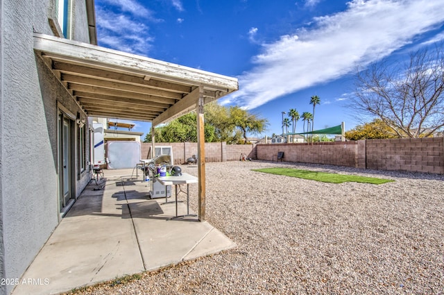 view of patio featuring a fenced backyard