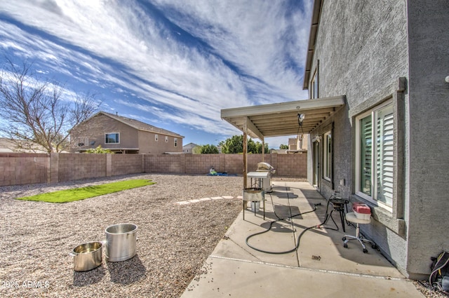 view of patio featuring a fenced backyard