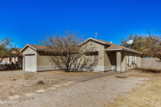 view of front of home featuring a garage