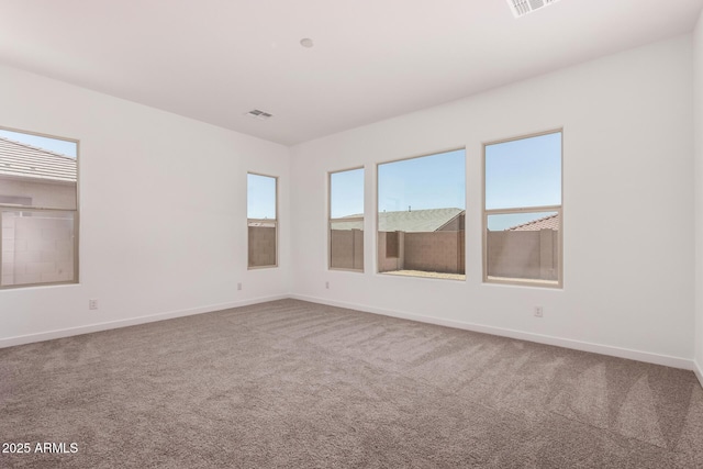 20273 W Monterey Way, Buckeye, AZ 85396 - carpeted spare room with baseboards