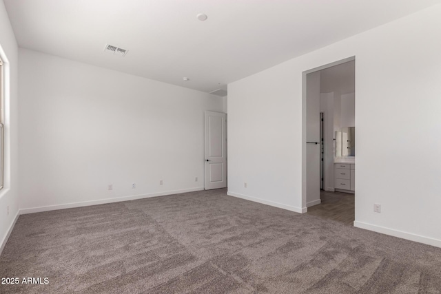 20273 W Monterey Way, Buckeye, AZ 85396 - unfurnished room with carpet flooring and baseboards