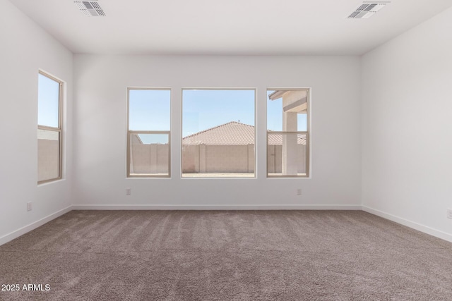 20273 W Monterey Way, Buckeye, AZ 85396 - carpeted spare room with healthy amount of natural light