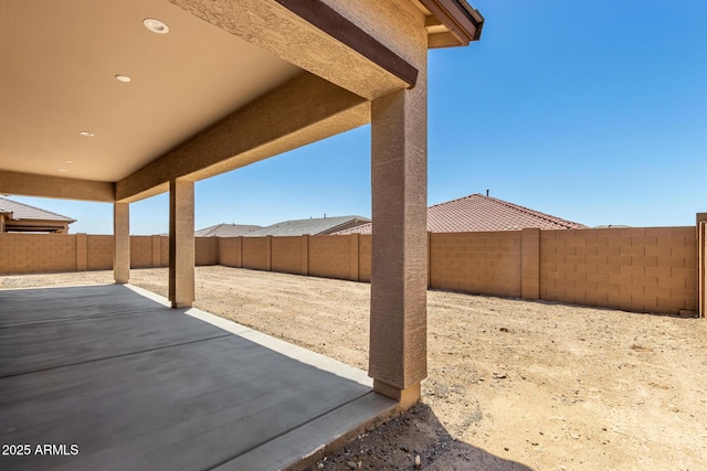 20273 W Monterey Way, Buckeye, AZ 85396 - fenced backyard with a patio area