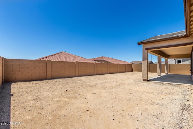 20273 W Monterey Way, Buckeye, AZ 85396 - fenced backyard with a patio area