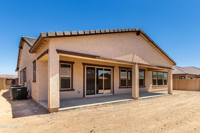 20273 W Monterey Way, Buckeye, AZ 85396 - rear view of property featuring stucco siding and a patio area