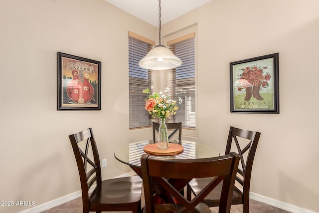 dining space with baseboards