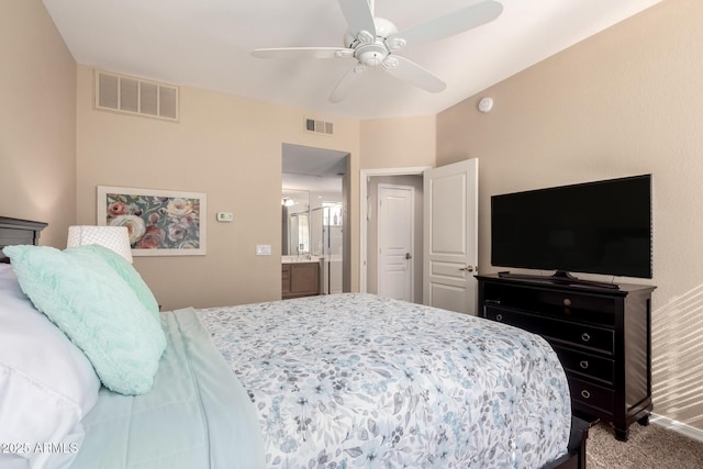 carpeted bedroom featuring visible vents and a ceiling fan