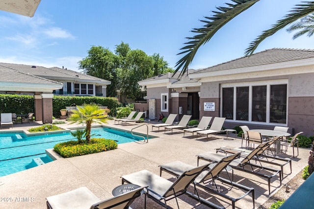 pool with a patio