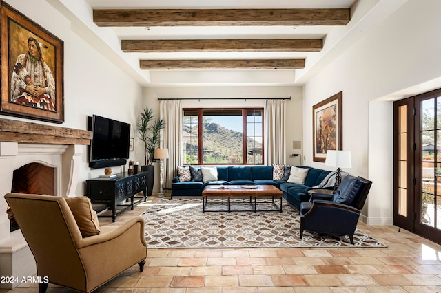 living room with beamed ceiling