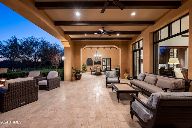 view of patio / terrace with an outdoor living space and ceiling fan