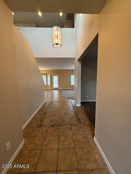 hall featuring tile patterned floors