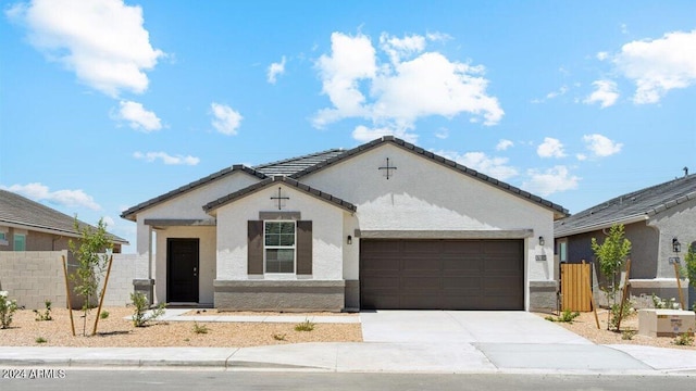 ranch-style house featuring a garage