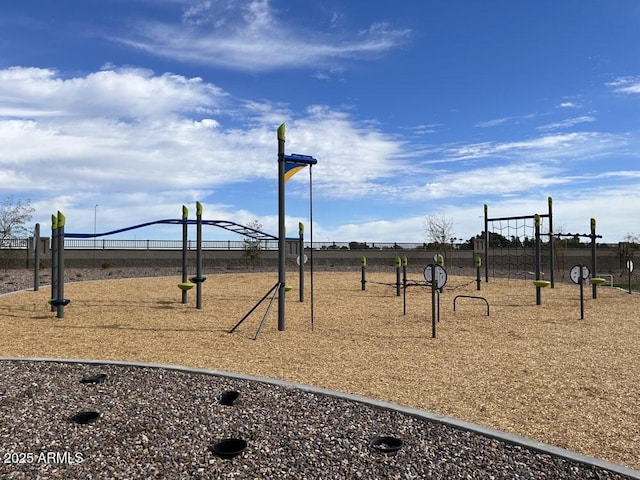 view of property's community featuring fence