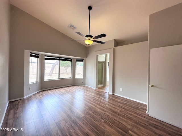 unfurnished room with ceiling fan, lofted ceiling, and dark hardwood / wood-style floors