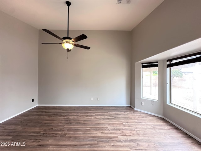 spare room featuring ceiling fan and wood-type flooring