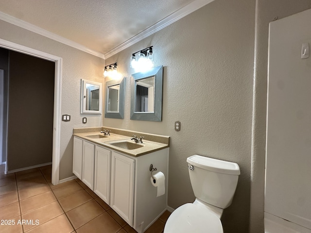 bathroom featuring a textured ceiling, tile patterned floors, vanity, toilet, and ornamental molding