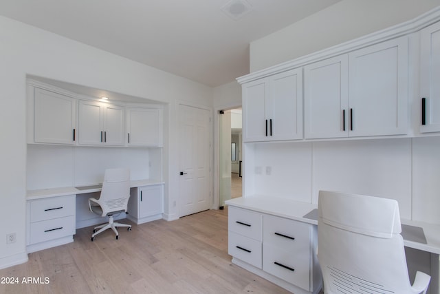 home office featuring light hardwood / wood-style flooring