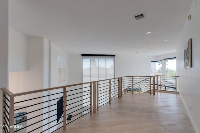 corridor featuring light hardwood / wood-style flooring