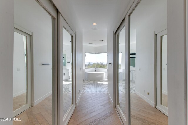 bathroom featuring vanity and shower with separate bathtub