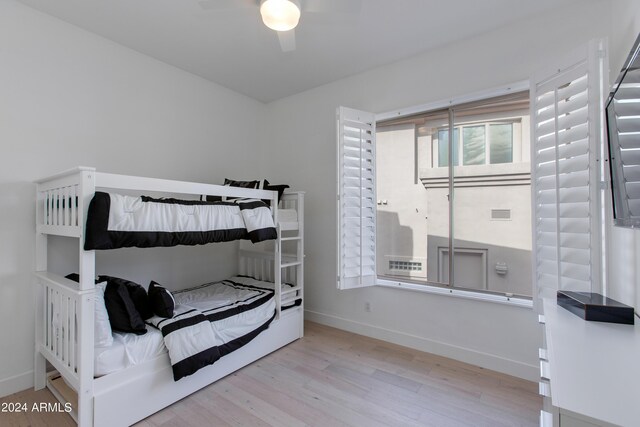 bathroom featuring vanity, an enclosed shower, and toilet