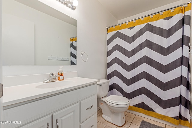 bathroom with a shower with shower curtain, tile patterned flooring, toilet, and vanity