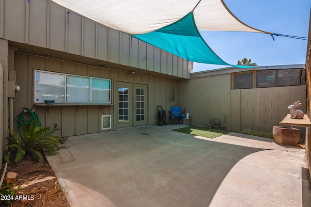 exterior space with french doors and a patio area