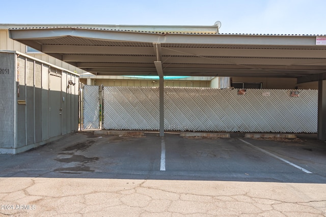 view of vehicle parking featuring a carport