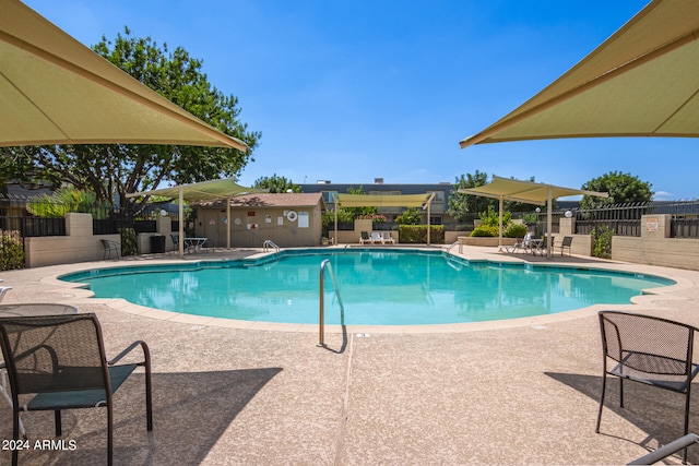 view of pool featuring a patio area