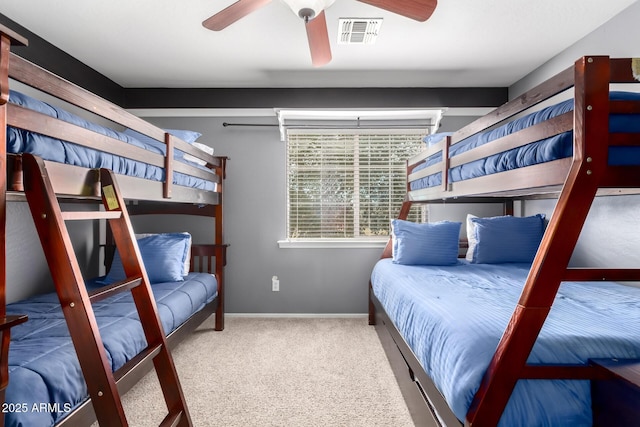 bedroom with ceiling fan and carpet flooring