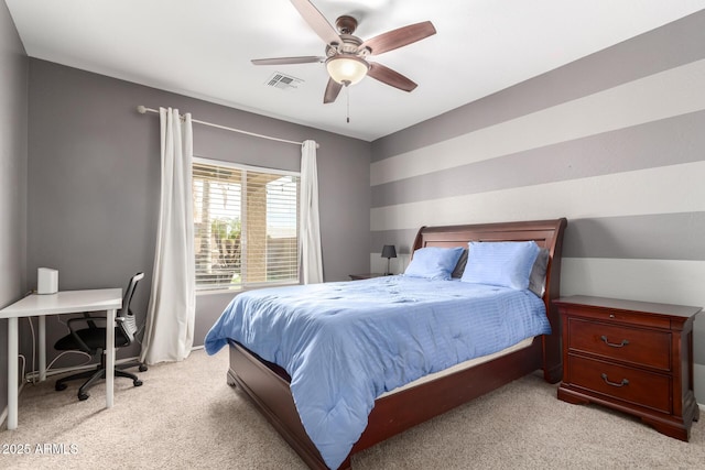 bedroom featuring ceiling fan and light colored carpet