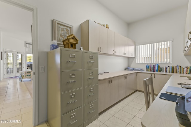 kitchen featuring light tile patterned floors and light countertops