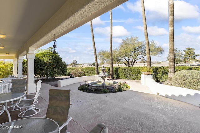 view of patio featuring outdoor dining space