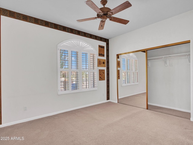15377 W Catalina Ct, Goodyear, AZ 85395 - unfurnished bedroom featuring carpet, a closet, and ceiling fan