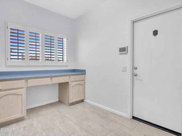 15377 W Catalina Ct, Goodyear, AZ 85395 - unfurnished office with built in desk and baseboards