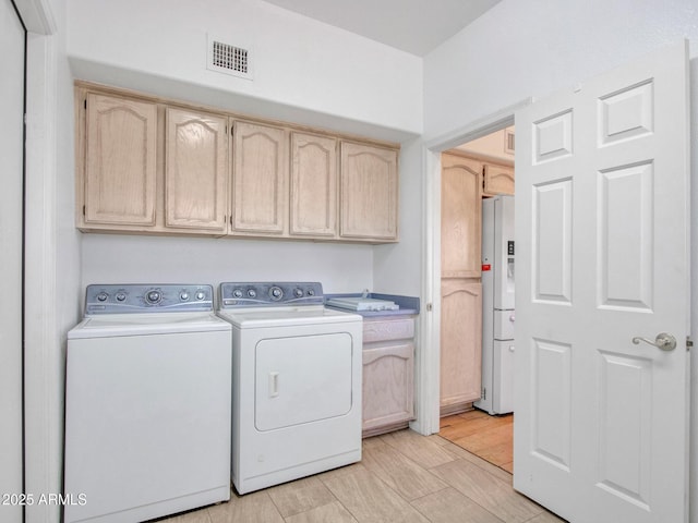 15377 W Catalina Ct, Goodyear, AZ 85395 - washroom featuring cabinet space and independent washer and dryer