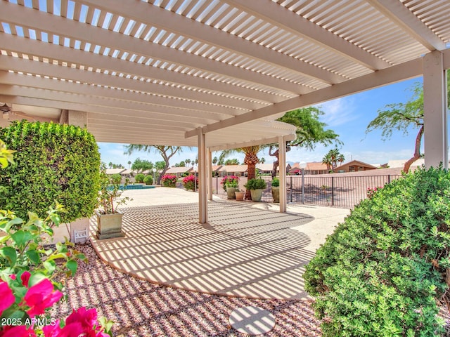 15377 W Catalina Ct, Goodyear, AZ 85395 - fenced backyard featuring a patio, a pergola, and a residential view