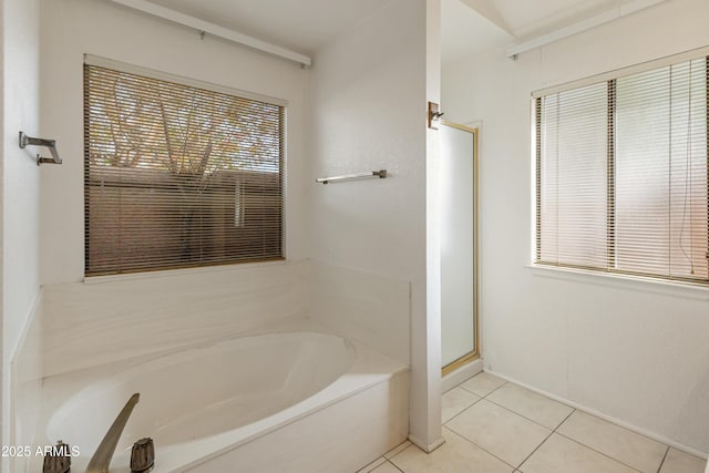 bathroom featuring independent shower and bath and tile patterned floors