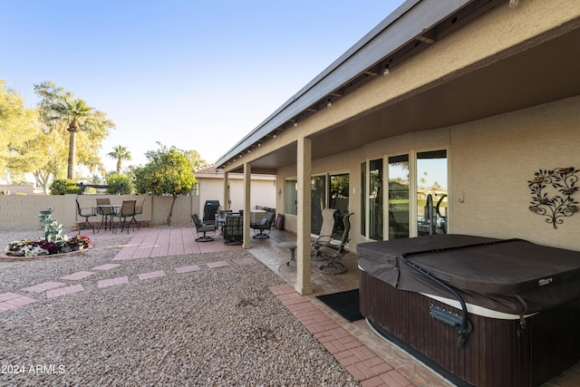 view of patio featuring a hot tub