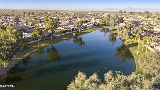 bird's eye view with a water and mountain view