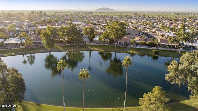 bird's eye view featuring a water and mountain view