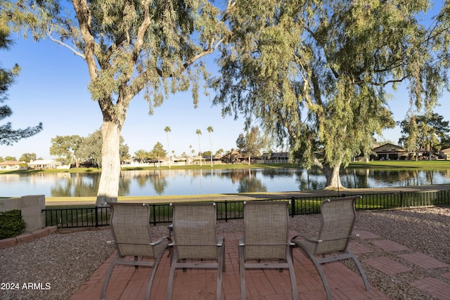 view of patio featuring a water view