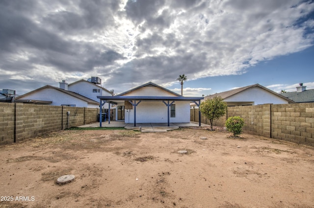 back of house featuring a patio